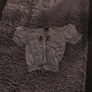 An off the shoulder crop top